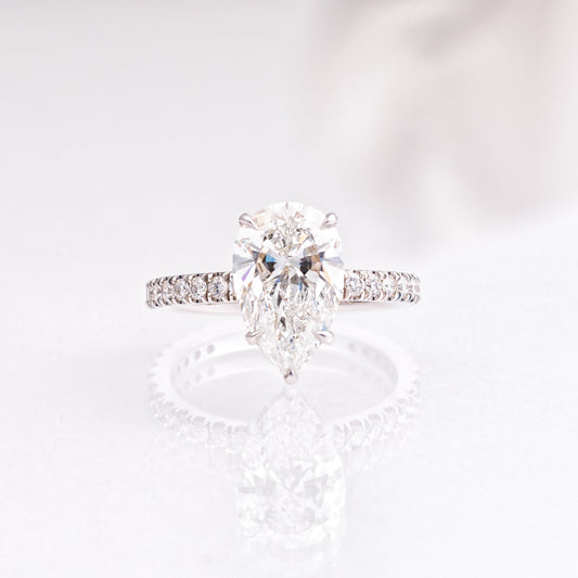 3.03 Carat Pear Diamond Engagement Ring with Hidden Halo and Pavé Band in 14K White Gold