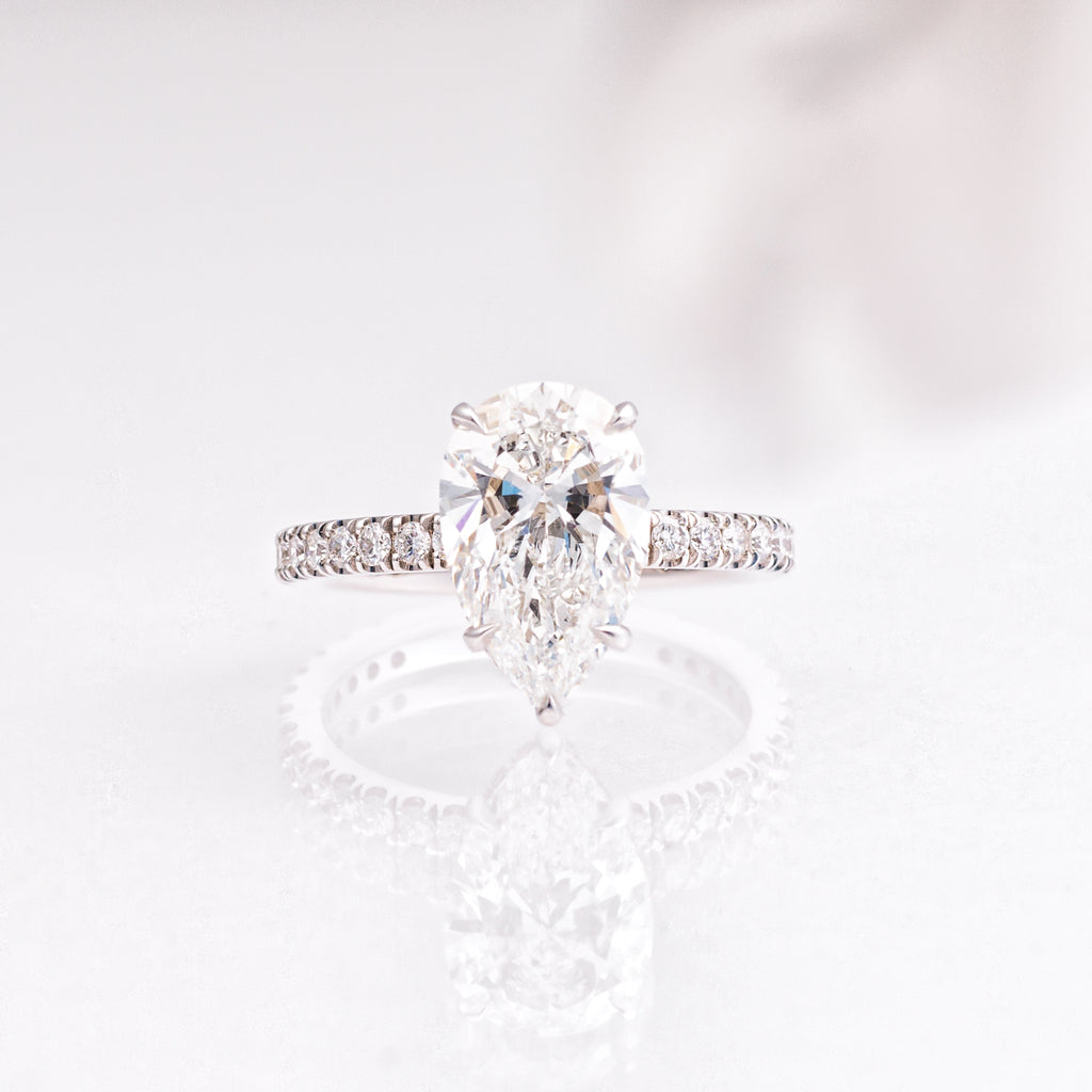 3.03 Carat Pear Diamond Engagement Ring with Hidden Halo and Pavé Band in 14K White Gold